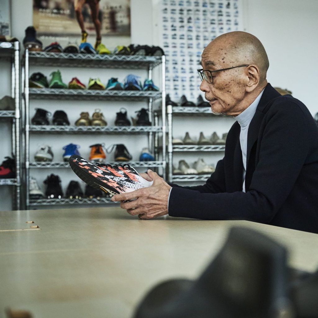 Toshiaki Omori with some models he designed for Adidas Adizero shoes