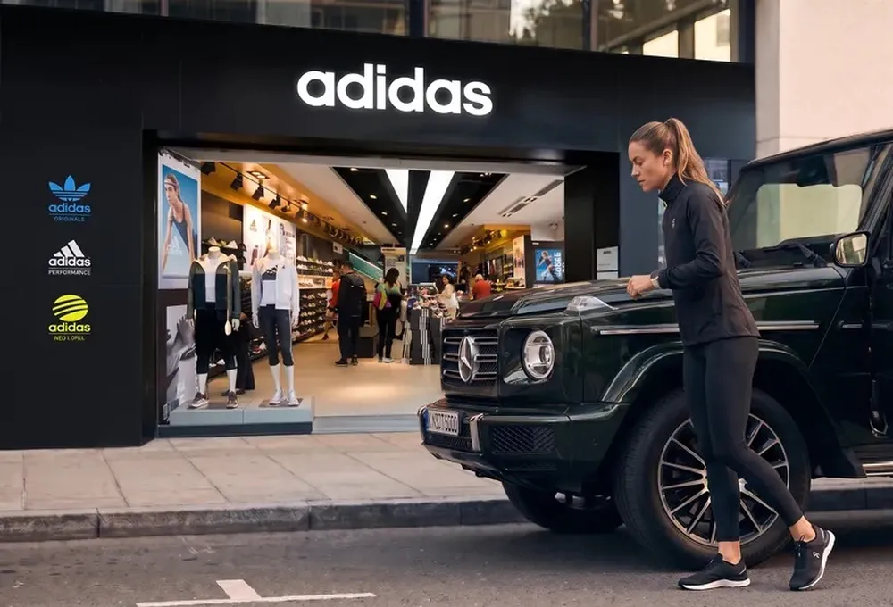 A wealthy posh lady just parked her G Wagon to enter an adidas store and spend 500 USD